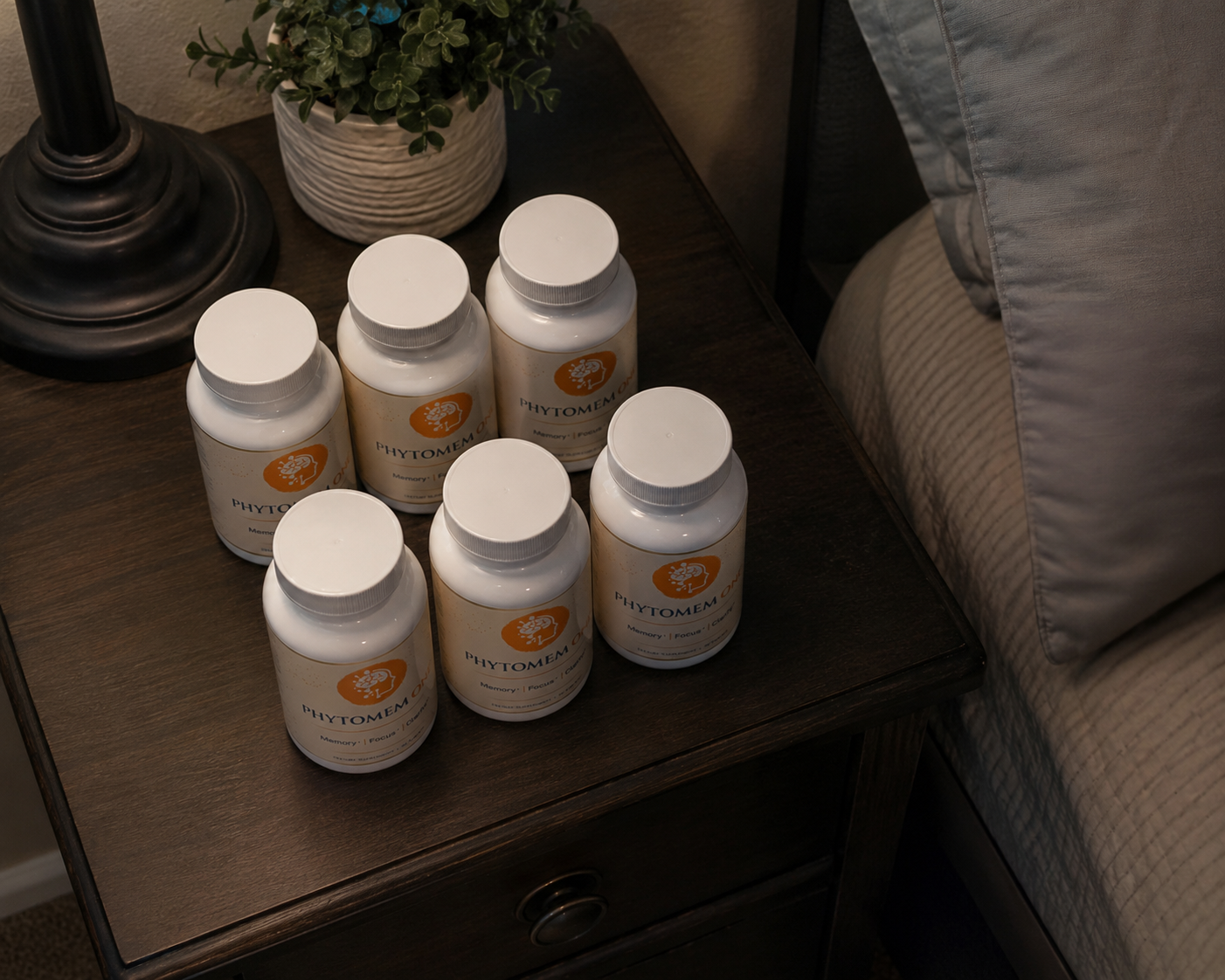 Six bottles of Phytomem One kept on the nightstand beside my bed as a six month supply stack